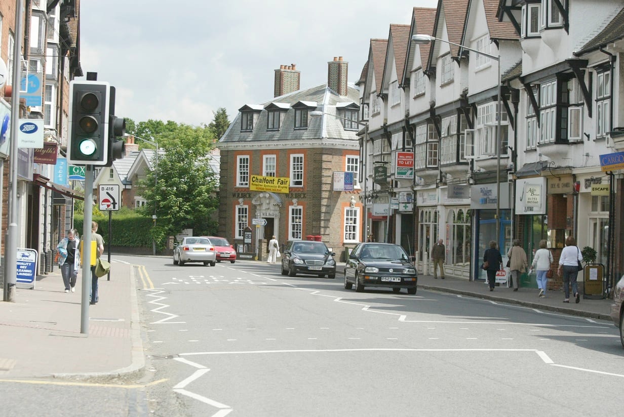 Shops and mock-Tudor parades along the main road through Gerrards Cross.