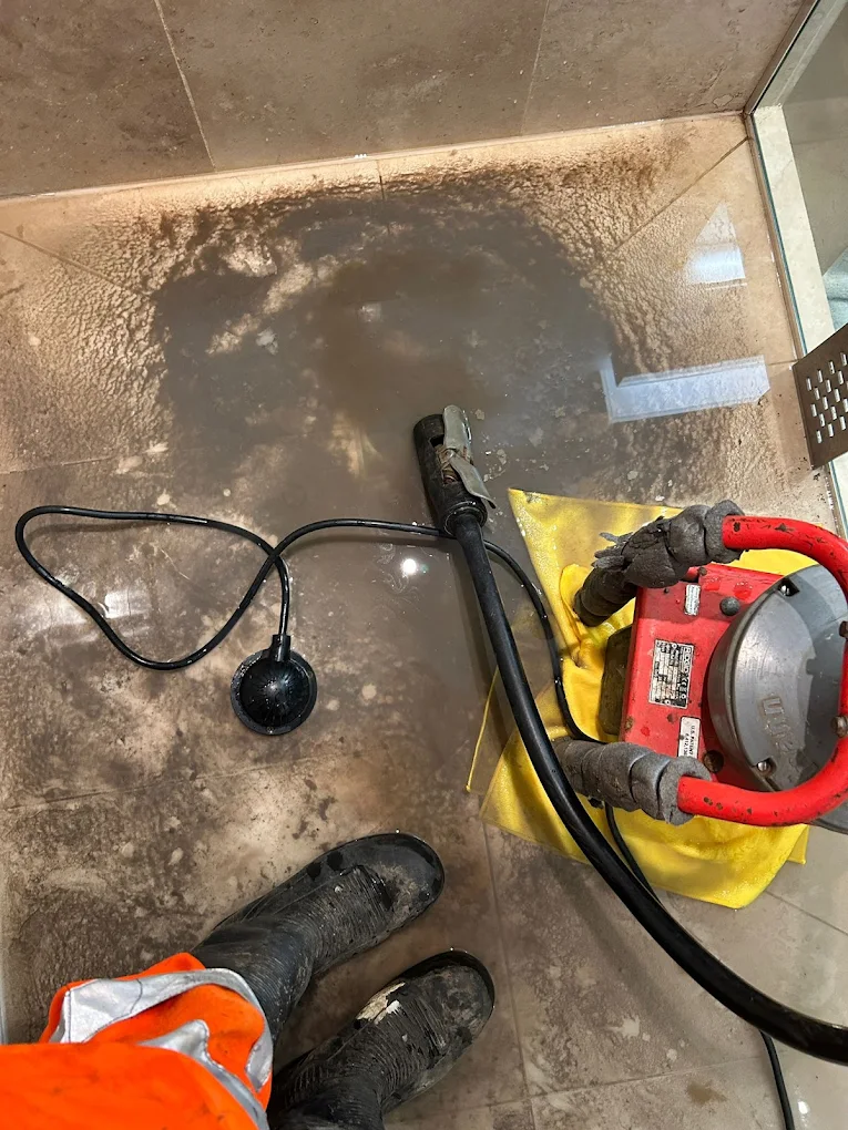 Drain cleaning in progress