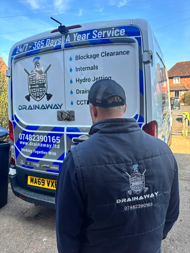 Drainaway engineer Reece with service van