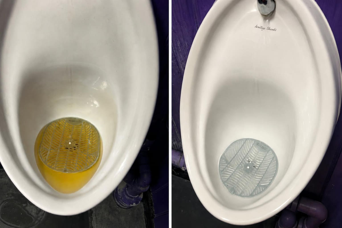 A commercial urinal holding standing waste over a blocked strainer, then clear and draining freely