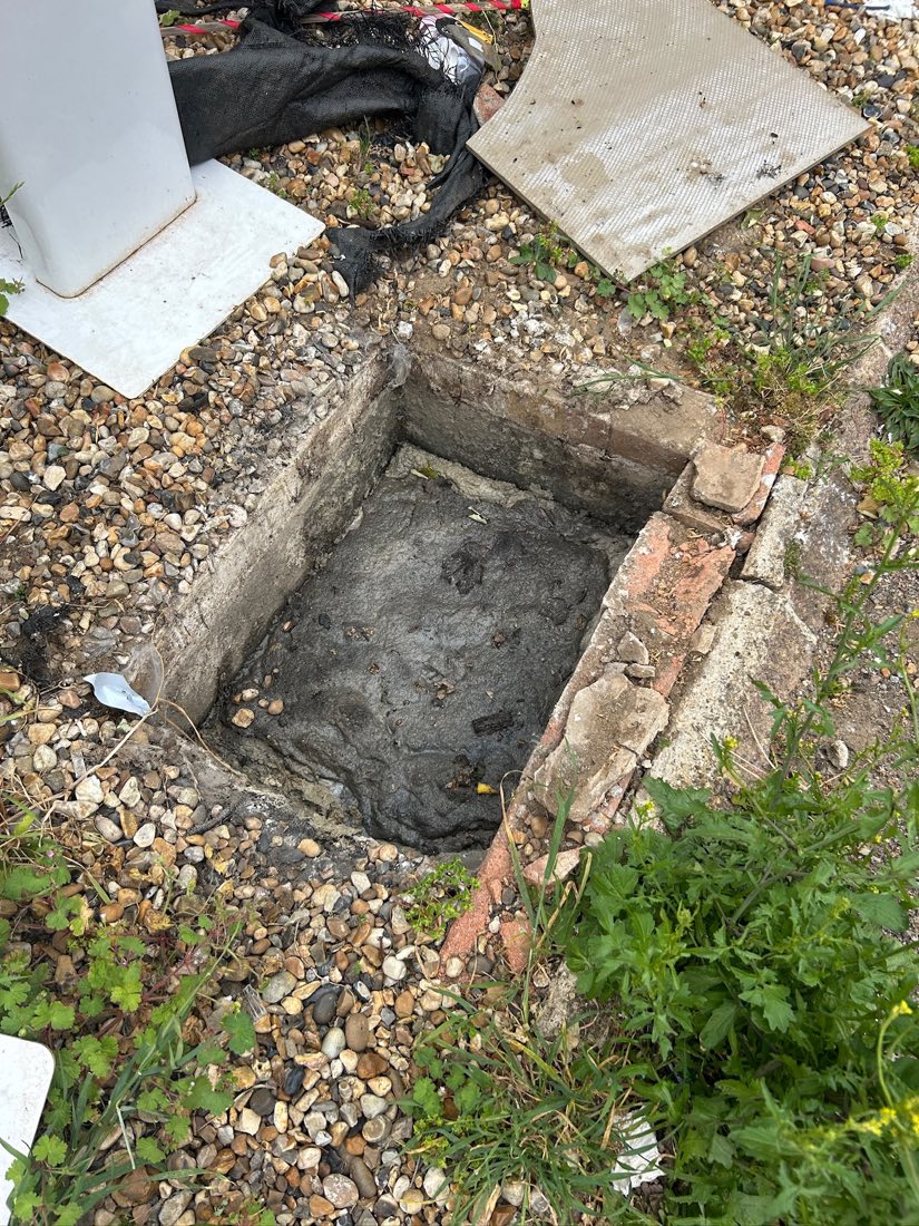 A brick inspection chamber dug out and cleaned down to the benching.